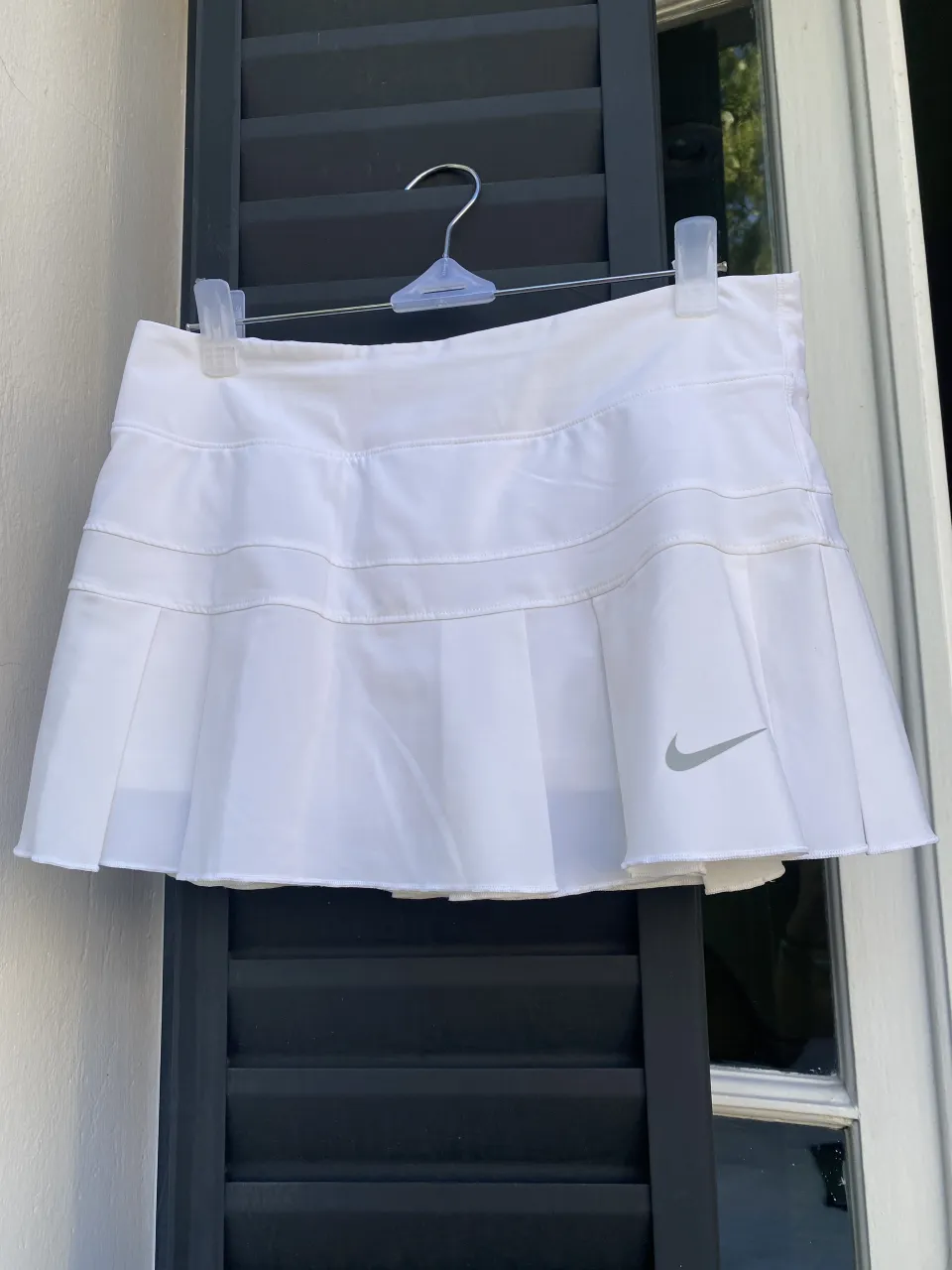 Pollera deportiva blanca con calza incluida. Marca Original.