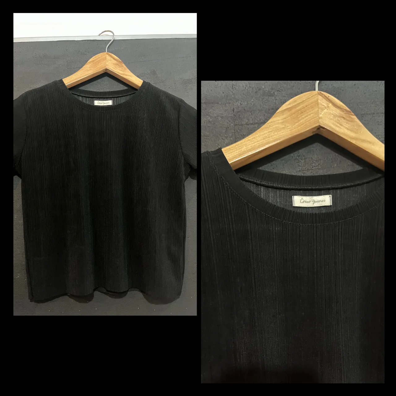 Remera negra de manga corta con textura acanalada.