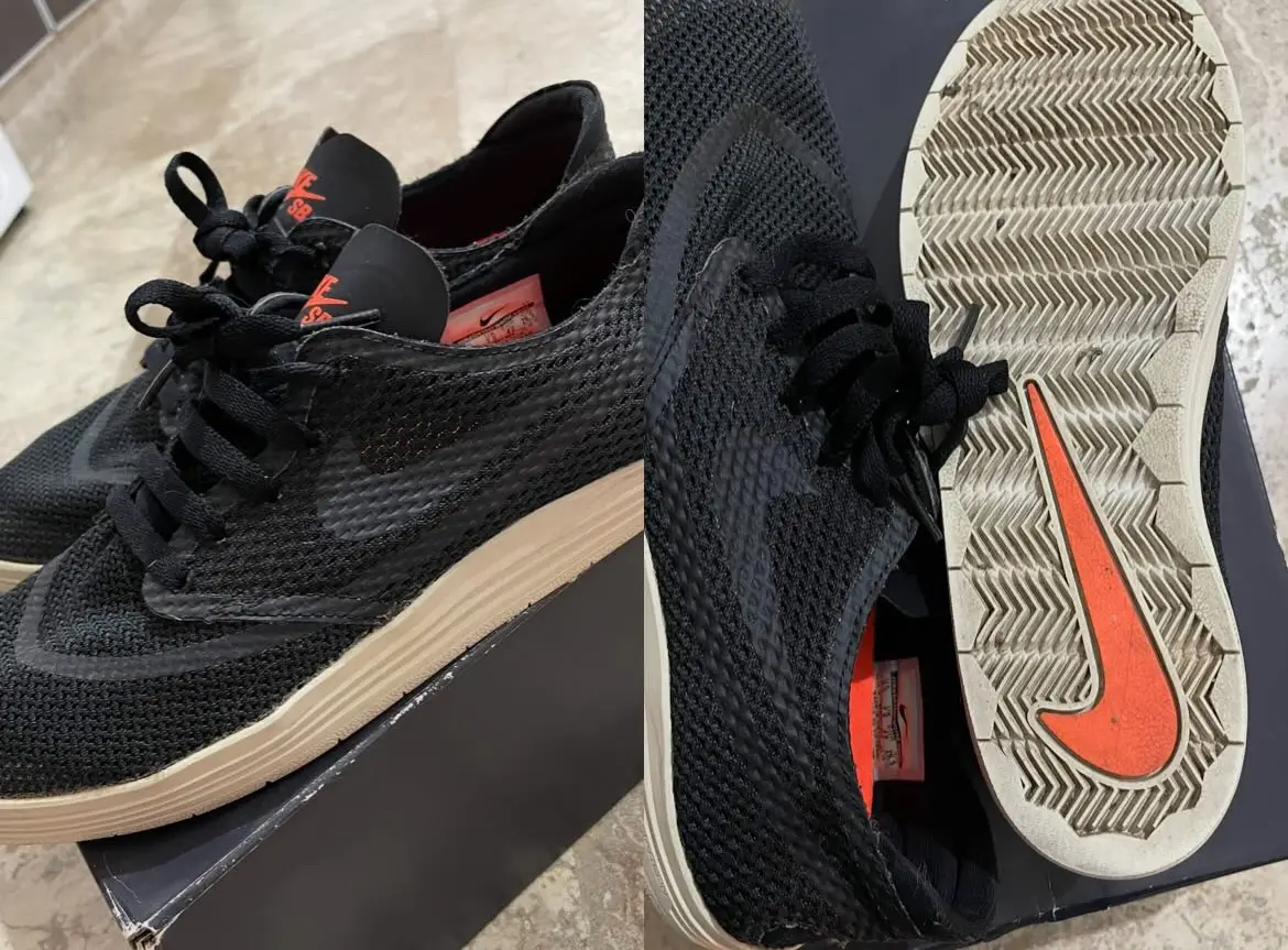 Zapatillas Nike SB negras, ideales para skate. Diseño moderno y resistente, con suela de goma y detalles en naranja. Perfectas para un look urbano y cómodo.