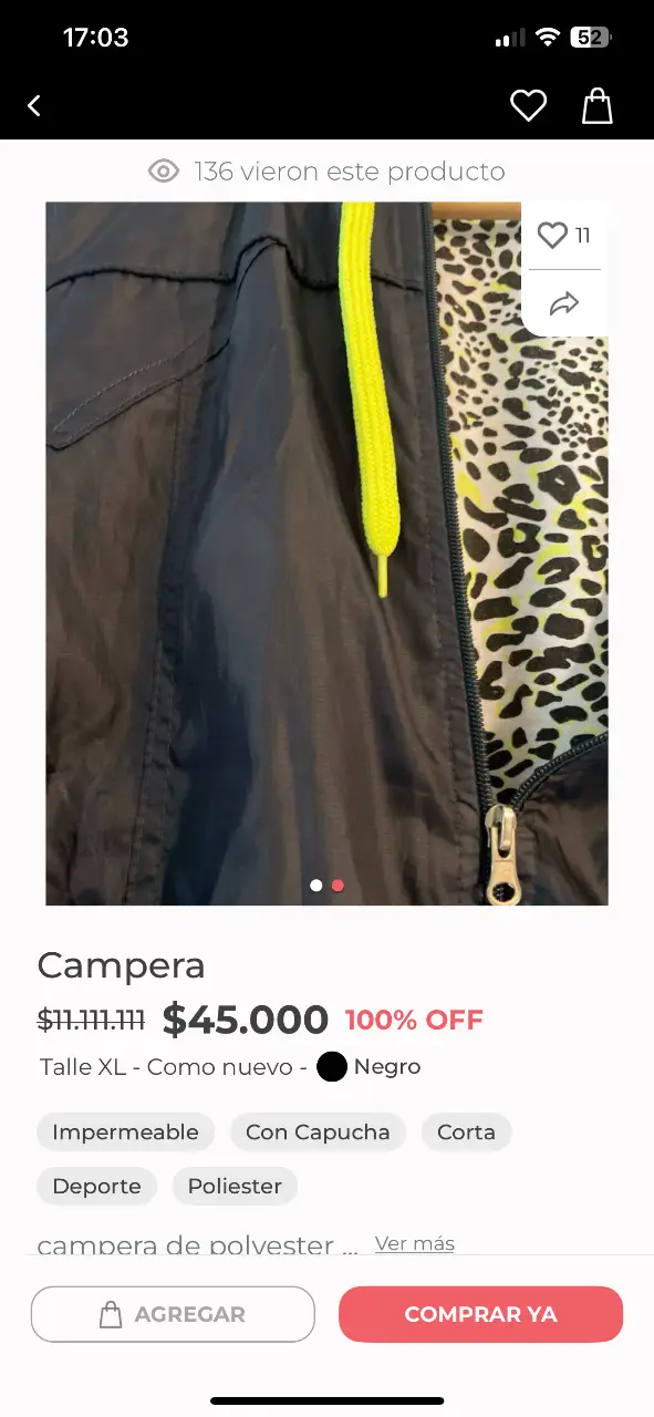 Campera negra con capucha y forro animal print. Ideal para usar en días de lluvia o como abrigo deportivo. Talle XL, como nueva.