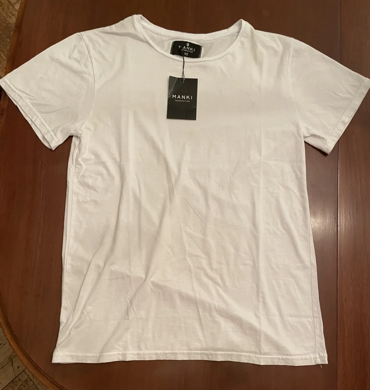 Remera Blanca lisa sin uso talle xs Manki