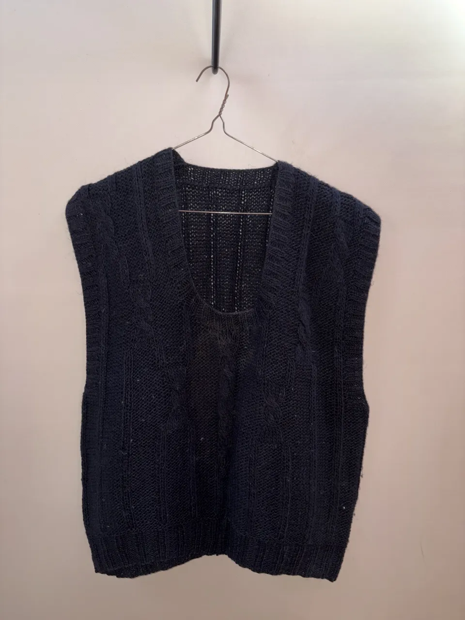 Chaleco de tejido grueso.