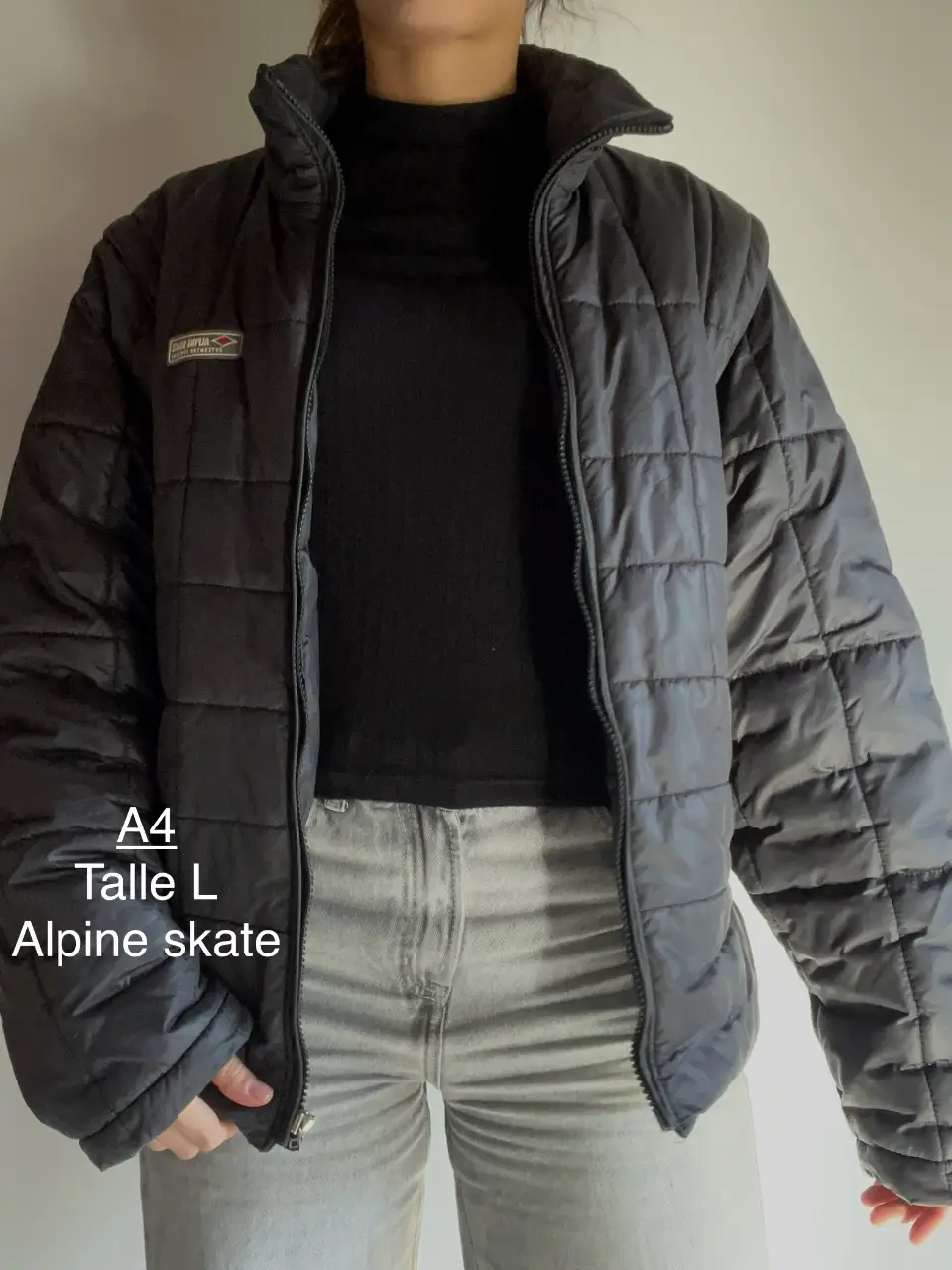 Campera inflable negra Alpine Skate, talle L. Ideal para el invierno, con cierre y cuello alto.