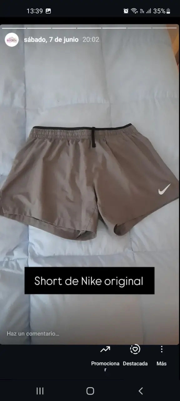 Short de Nike original, color gris, ideal para actividades deportivas. Perfecto para un look casual y cómodo.