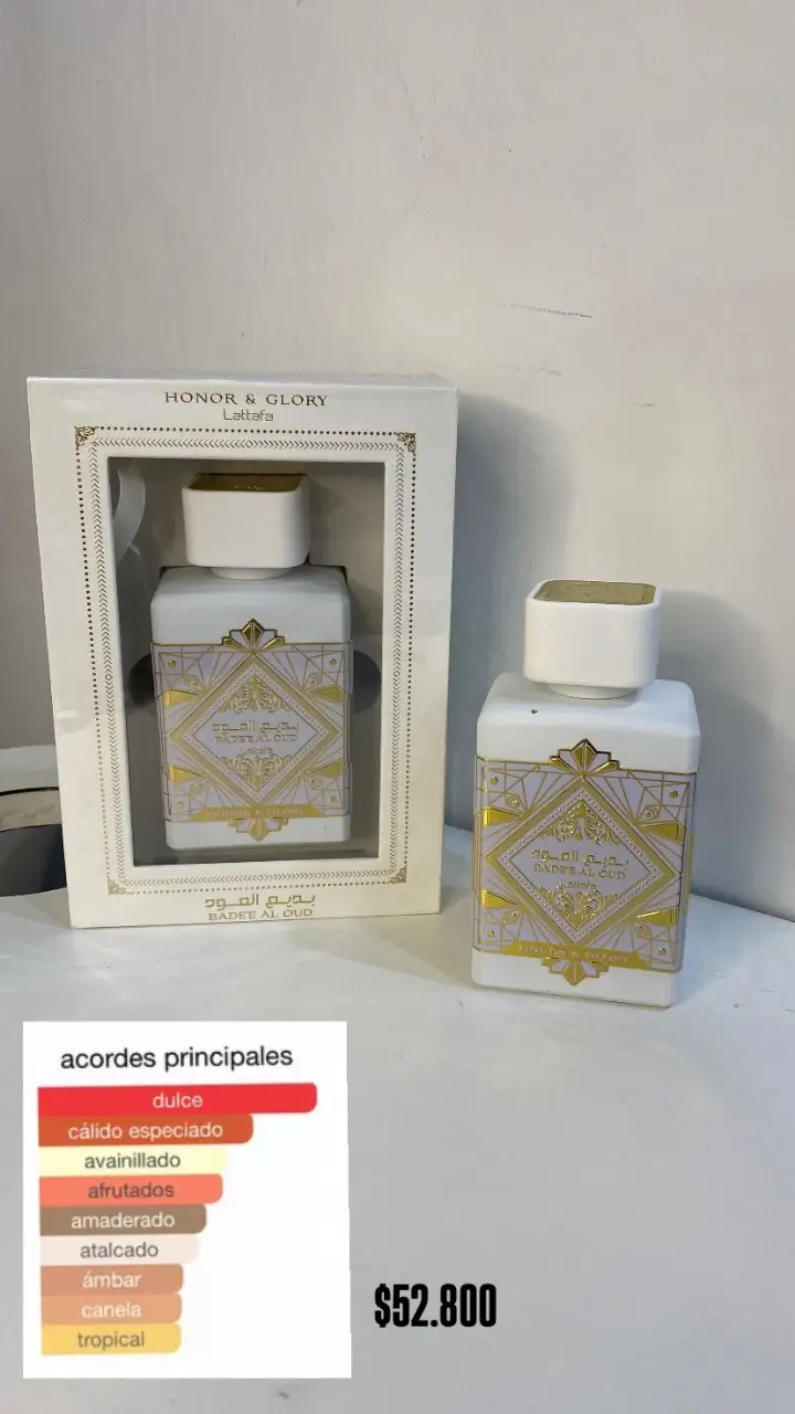 Perfume "Honor & Glory" de Lattafa, un aroma cautivador con notas dulces y especiadas. Ideal para quienes buscan una fragancia sofisticada y duradera. Presentado en un elegante frasco blanco con detalles dorados, perfecto para regalar o para uso personal.