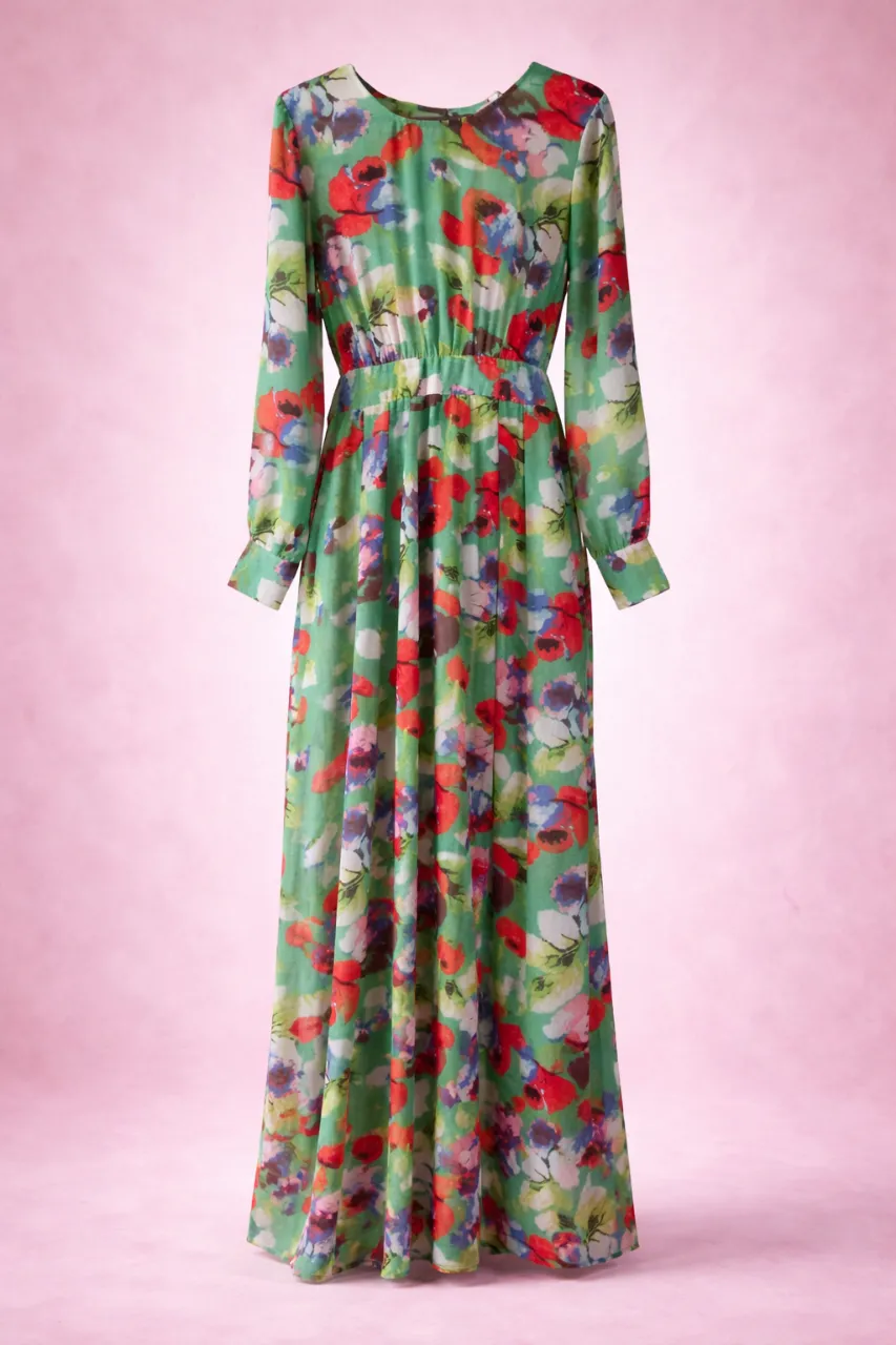Vestido largo de gaza estampado floral, con mangas largas y cintura elastizada. Ideal para un look fresco y femenino.