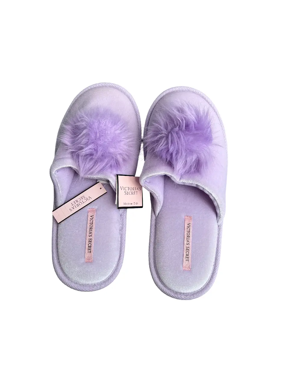Lindas pantuflas de Victoria's Secret, color lila con detalle de pompón. ¡Perfectas para estar cómoda en casa!