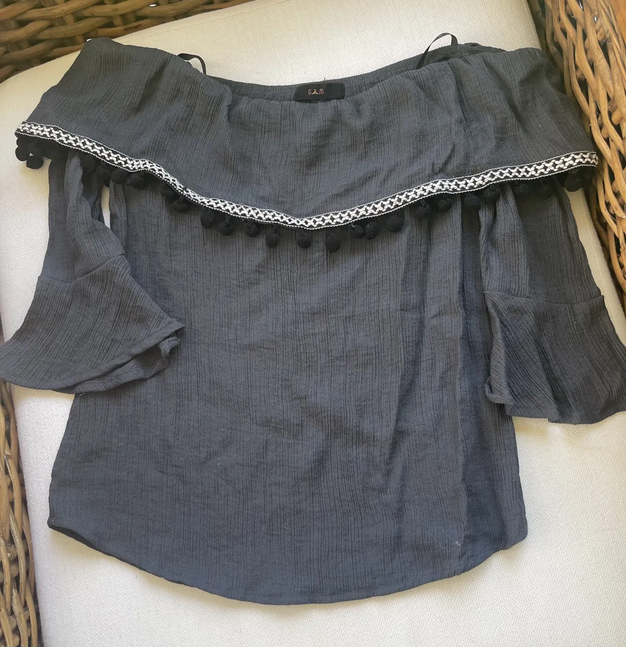Blusa E m