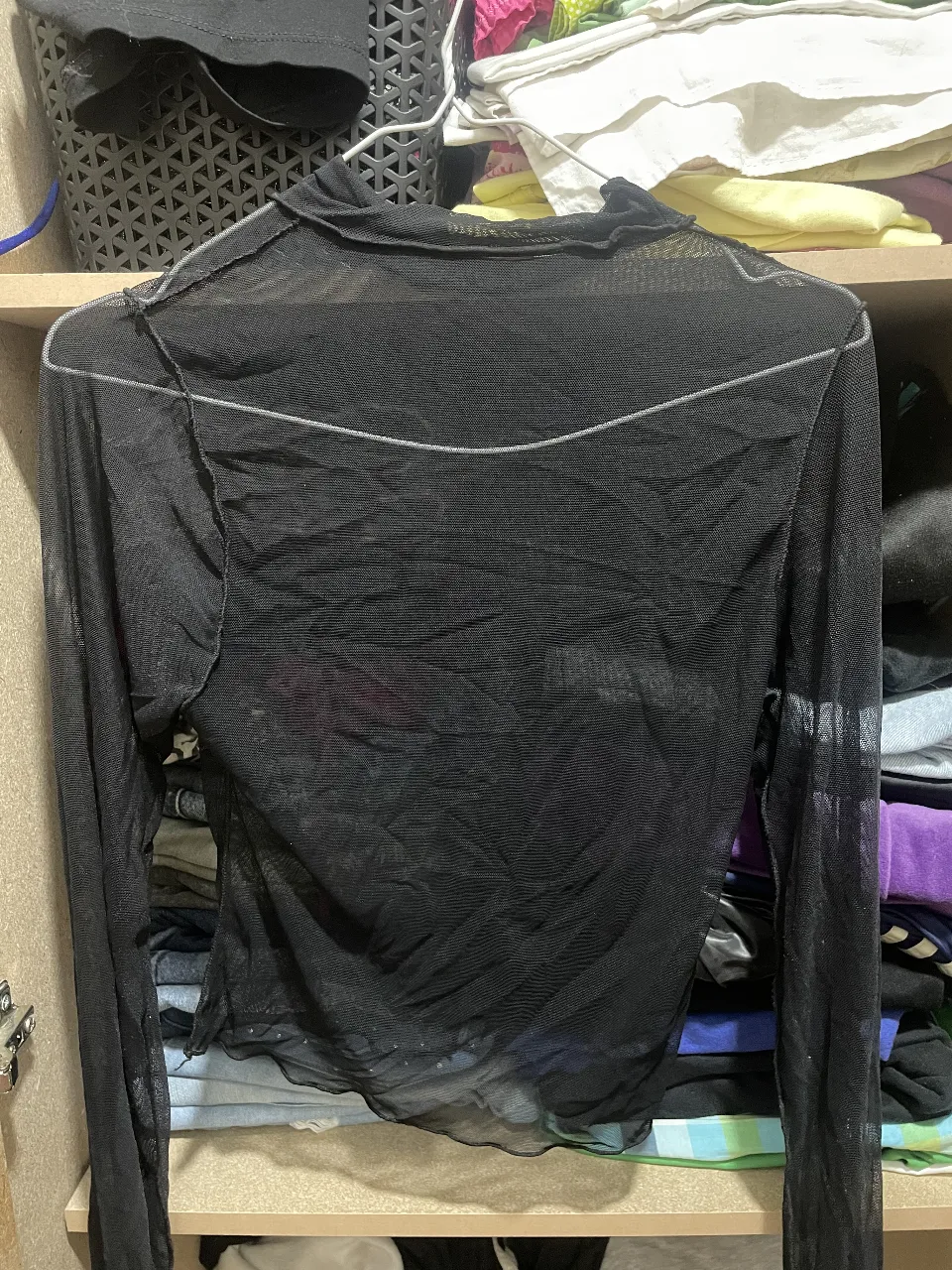 Remera negra trasparente muy flexible y al cuerpo   SIN USO 