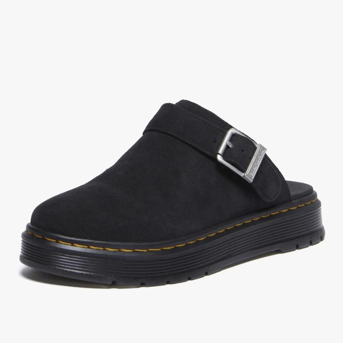 Zuecos negros de gamuza con hebilla metálica y suela gruesa. Perfectos para un look casual y moderno.