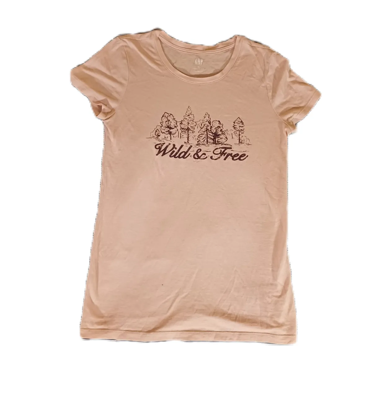 Remera de algodón color rosa pálido con estampa "Wild & Free" de árboles y paisaje. Ideal para un look casual y relajado.
Talle etiquetado XS, va también para un S.
sisa a sisa: 40 cm
largo: 62 cm