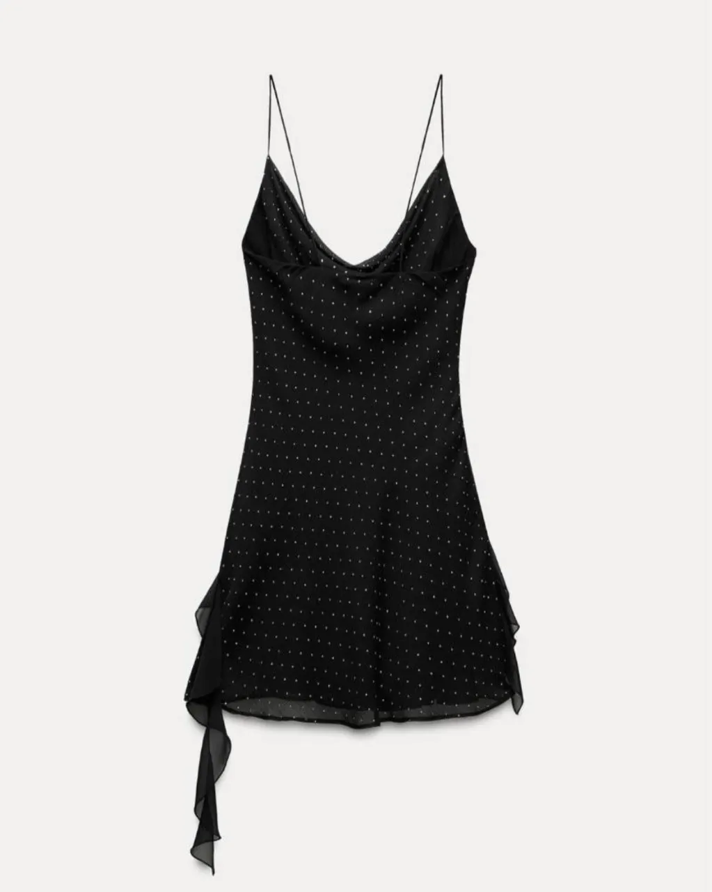 Vestido ZARA negro corto con tiras finas y detalles de volados asimétricos. Posee pequeños puntos brillantes en toda la tela.
nuevo sin uso! me quedo chico ;(