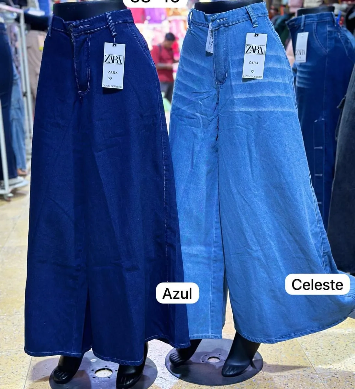 Pantalones palazzo de jean, tiro alto, con tajos frontales. Disponibles en dos tonos de azul, ideales para un look moderno y cómodo.