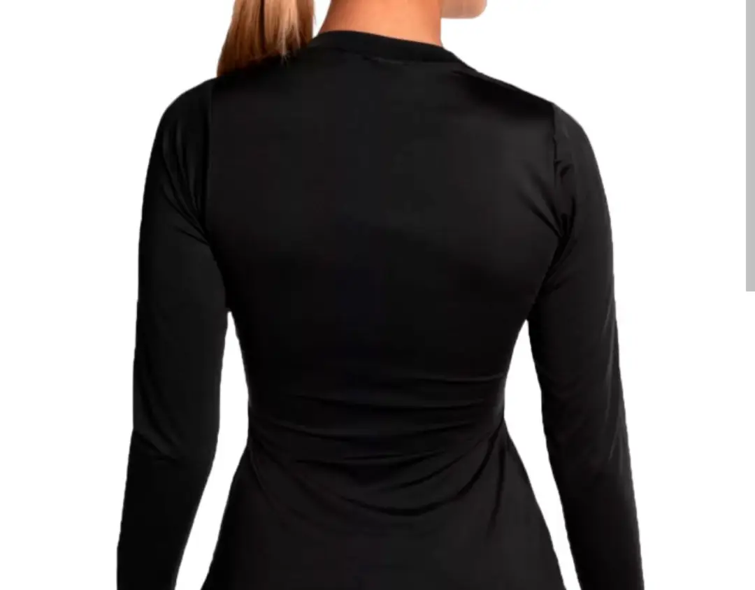 Remera termica manga larga para mujer, color negro, ideal para proteger del frio.. Diseño ajustado y cómodo. talle L /M
