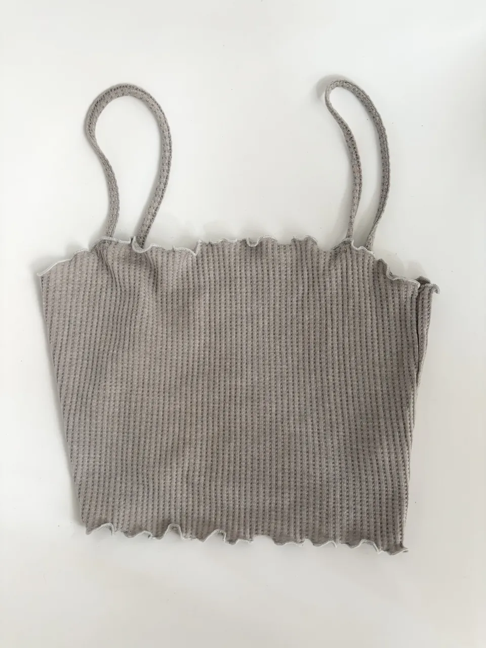 Top gris TheMarket nuevo🩶  es bastante elastizado. Va bien a 80/85/90

// top morley tiras 