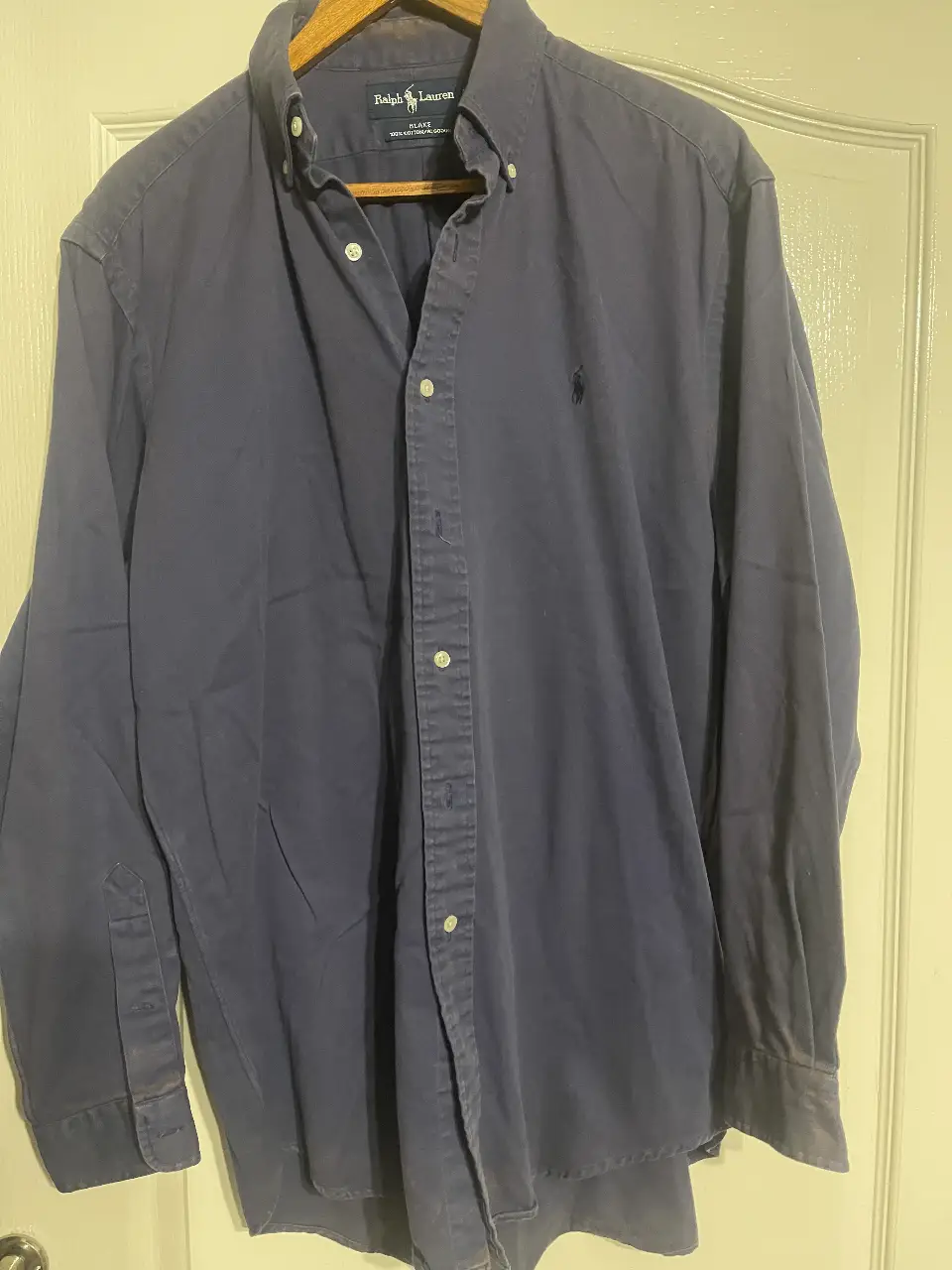 Camisa Ralph Lauren manga larga, color azul, corte clásico, ideal para un look casual y cómodo.