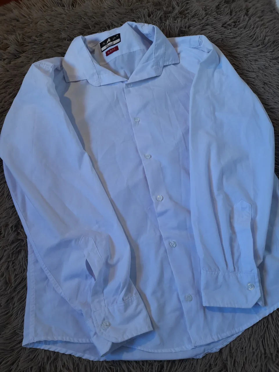 Camisa Danielli Blanca 
Talle xl/46
Medidas: largo de mangas 62cm. Axila/axila 58cm. Largo total 70cm. 