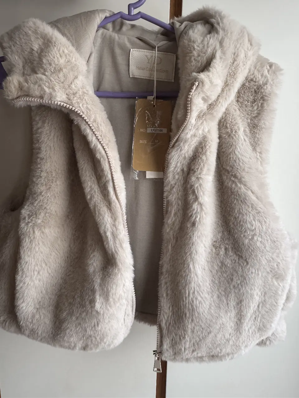 Chaleco de piel sintética con capucha para mujer, con bolsillos laterales, Ideal para un look casual y abrigado. Talle M.