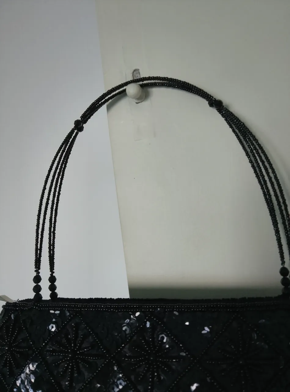 Cartera Unknown - Vista 3