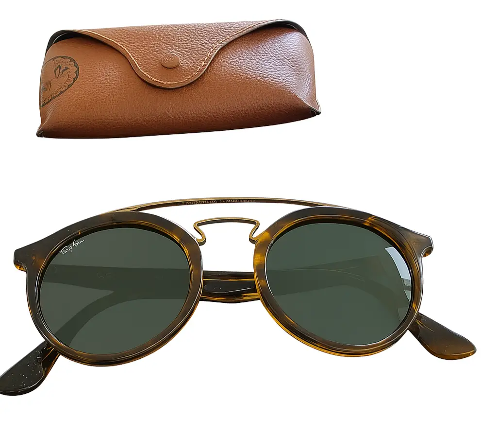 Anteojos de Sol Ray-Ban Gatsby. Armazón carey, puente oro y lentes verde oscuro. Incluye estuche original. Talle S. Sin marcas. Impecable. 