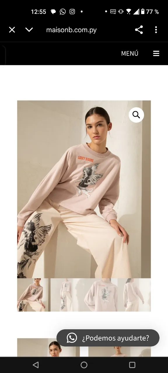 Buzo de algodón color rosa pálido con estampa de querubín y la frase "LUCKY RIDERS". Diseño oversize y moderno, ideal para un look casual y canchero.