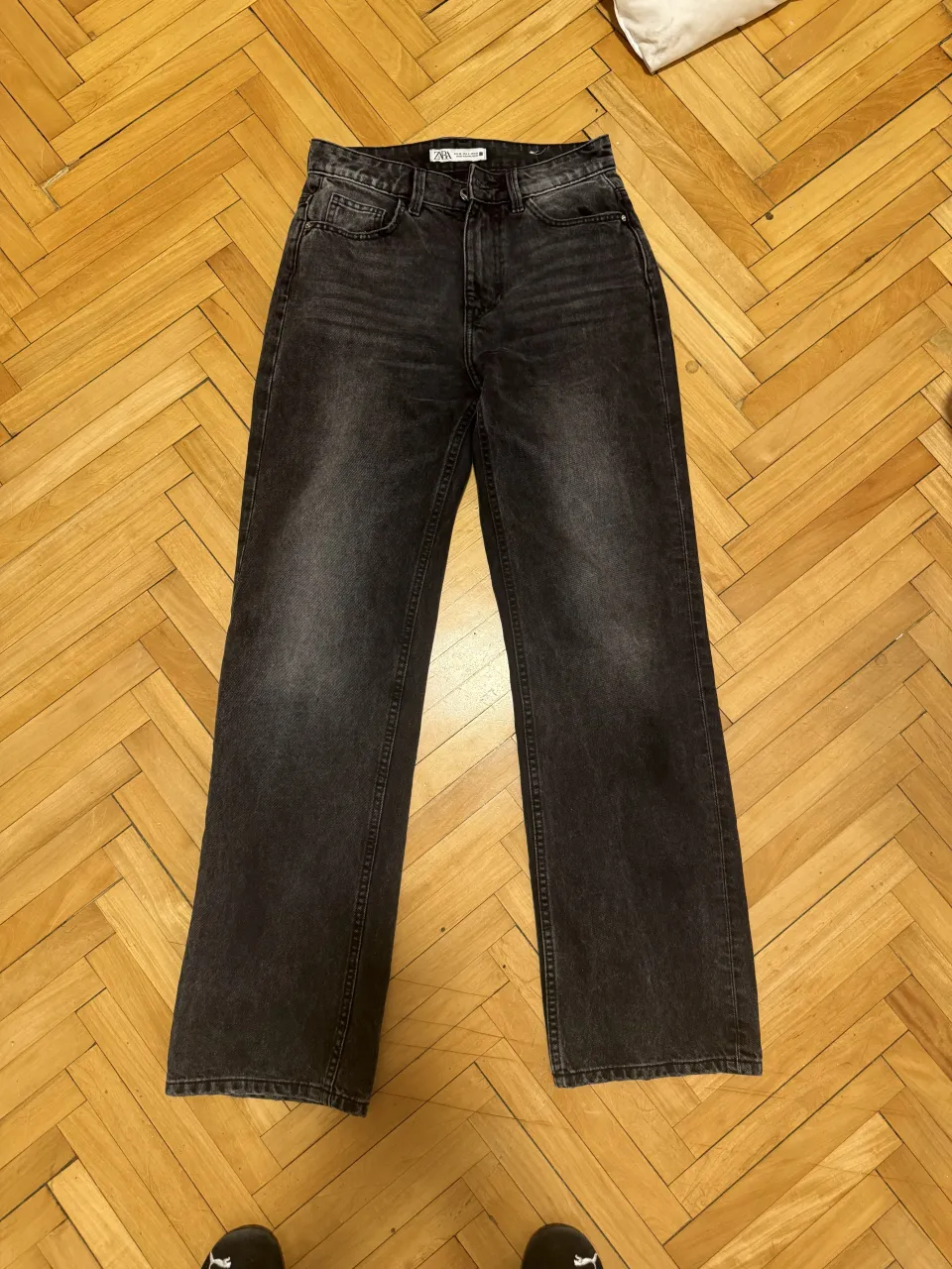 Jeans negros con lavado