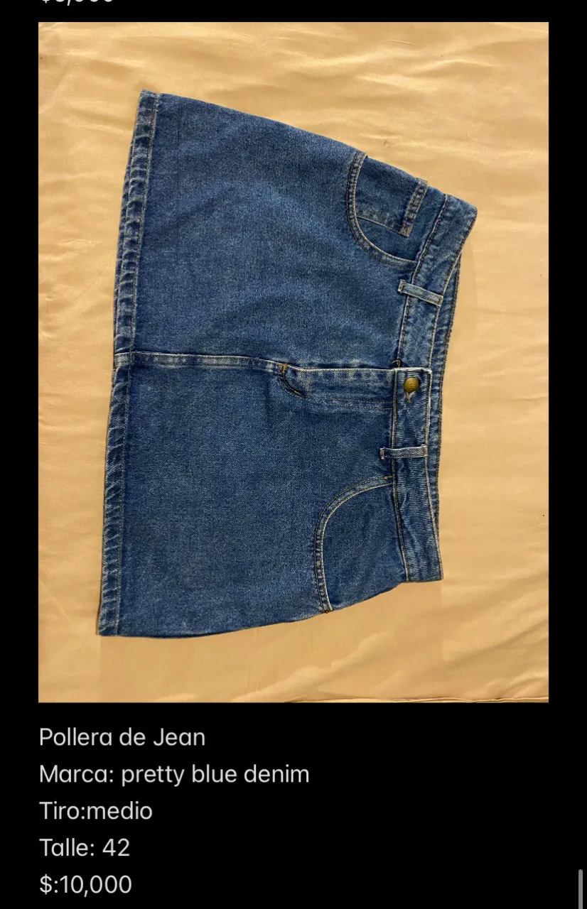 Pollera de jean azul, tiro medio, talle 42. Marca: pretty blue denim. Ideal para un look casual.