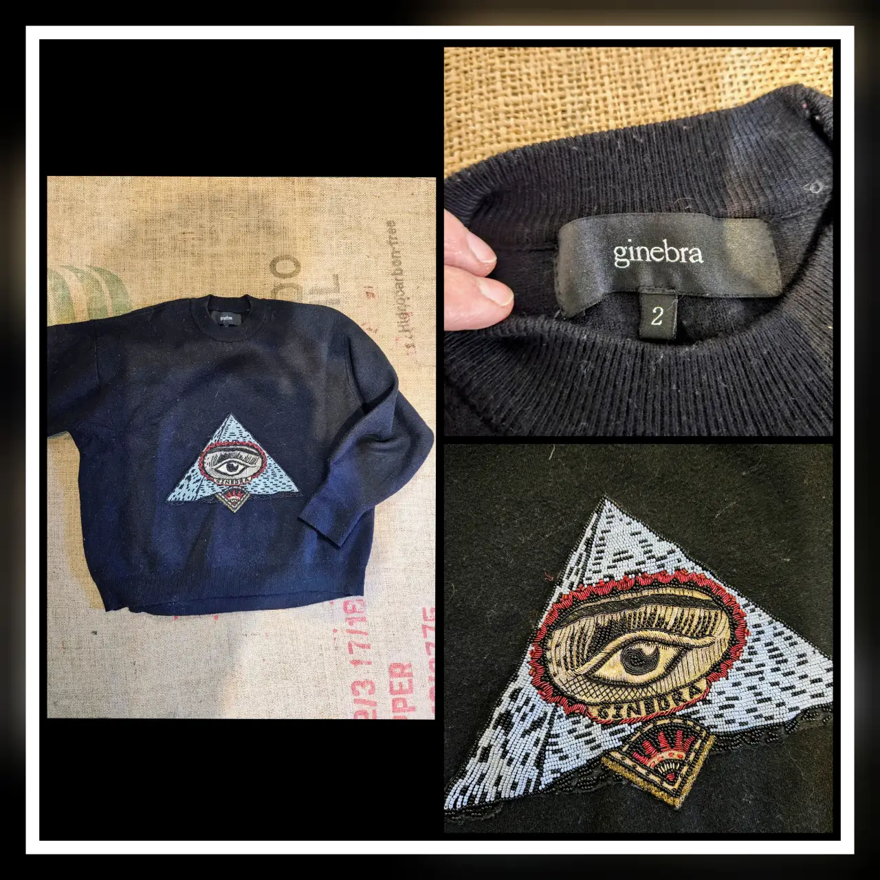 Sweater negro de la marca Ginebra, con un diseño artesanal de un ojo en un triángulo en el frente. El ojo está bordado con detalles en rojo, dorado y negro, y el triángulo está adornado con cuentas celestes y blancas. Un sweater único y con estilo.