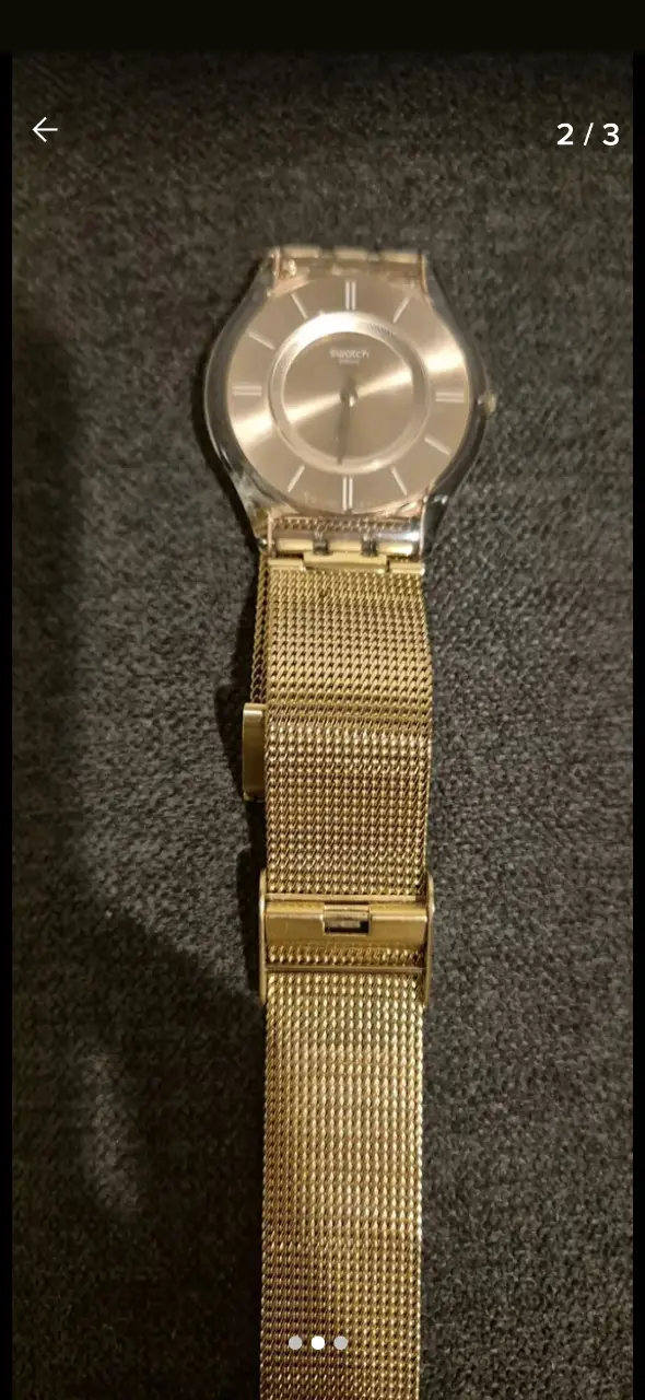 Reloj Swatch rose gold con malla metálica. Diseño elegante y moderno, ideal para complementar cualquier look.