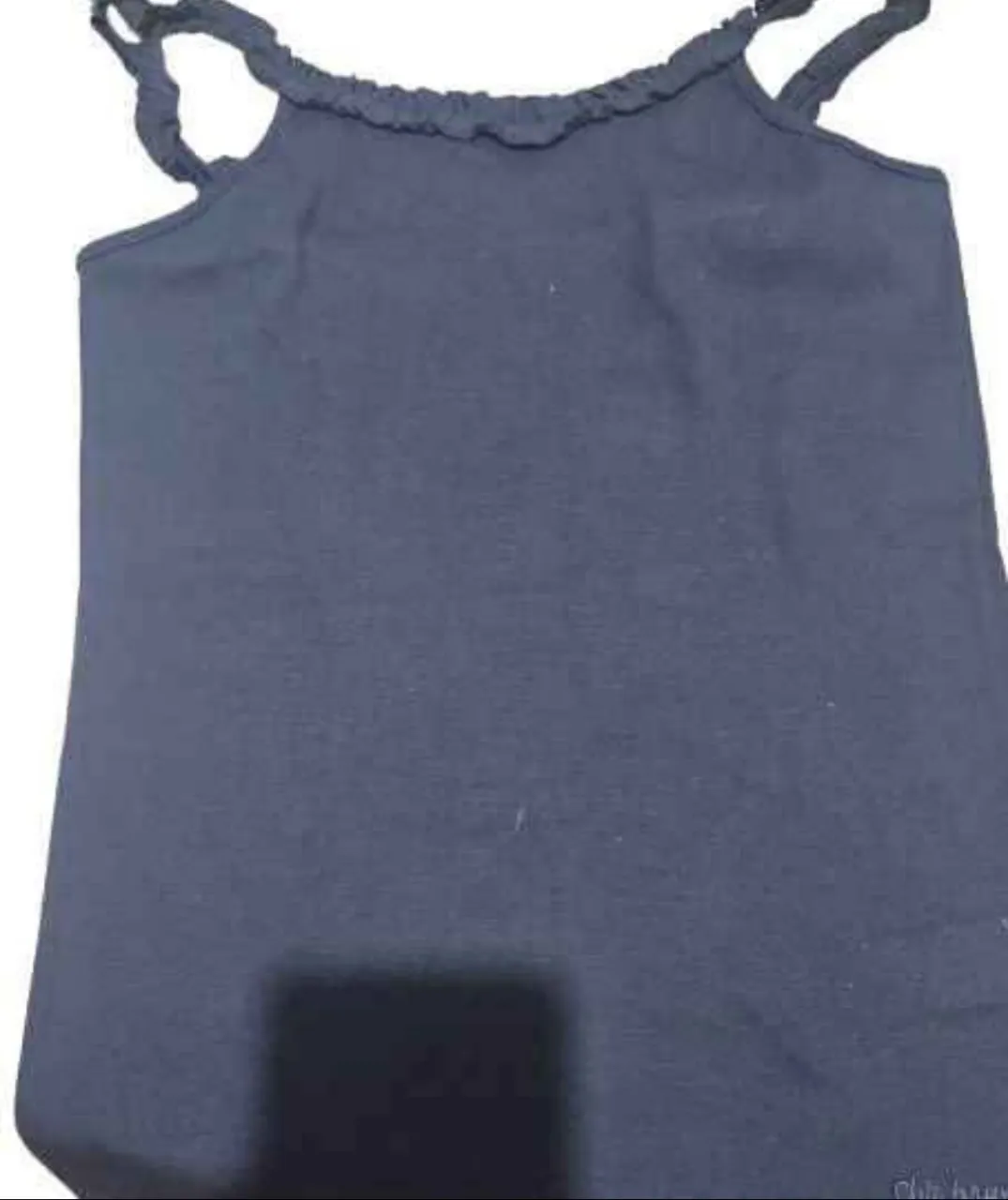 Musculosa de mujer, color azul, con detalle de volados en el cuello. Ideal para el verano.