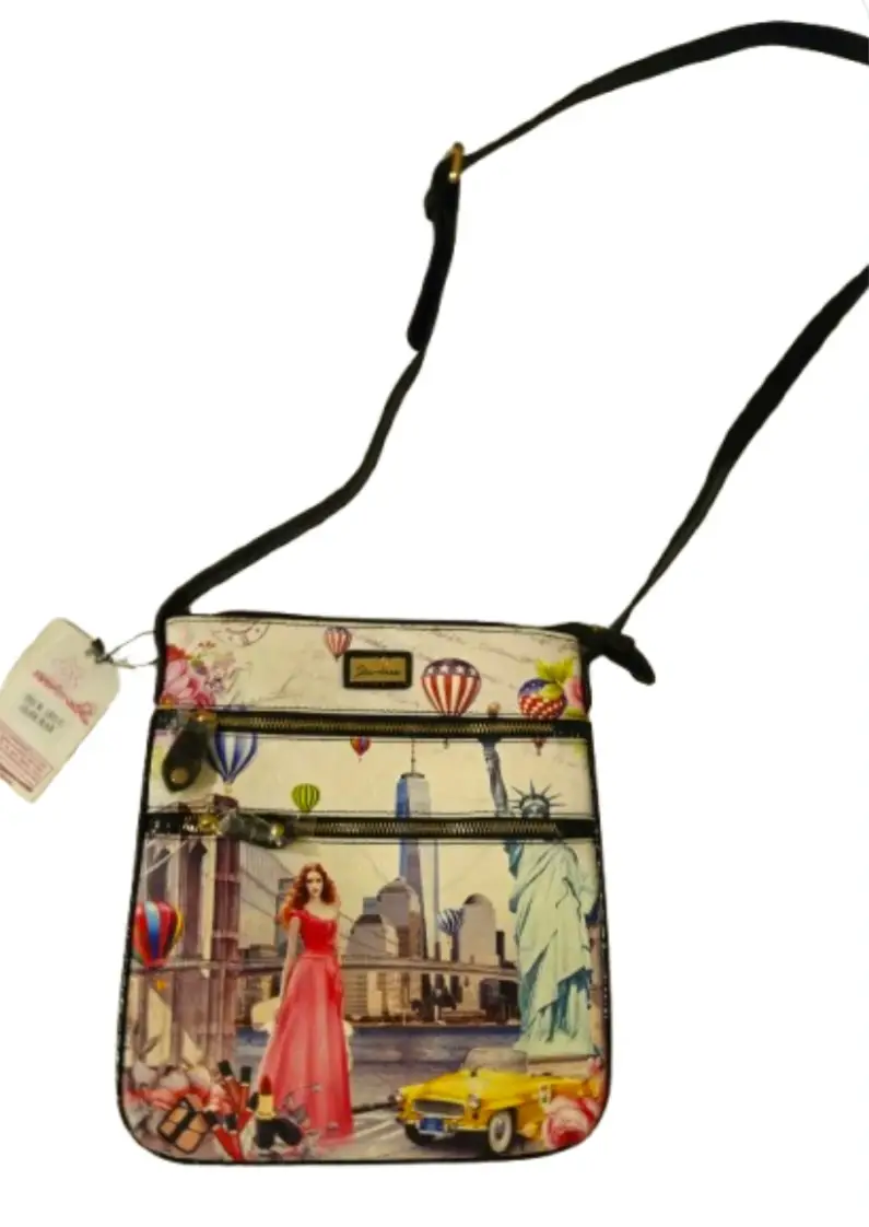 Bandolera con estampado de Nueva York, con detalles de la Estatua de la Libertad, el puente de Brooklyn y globos aerostáticos. Ideal para un look casual y moderno.