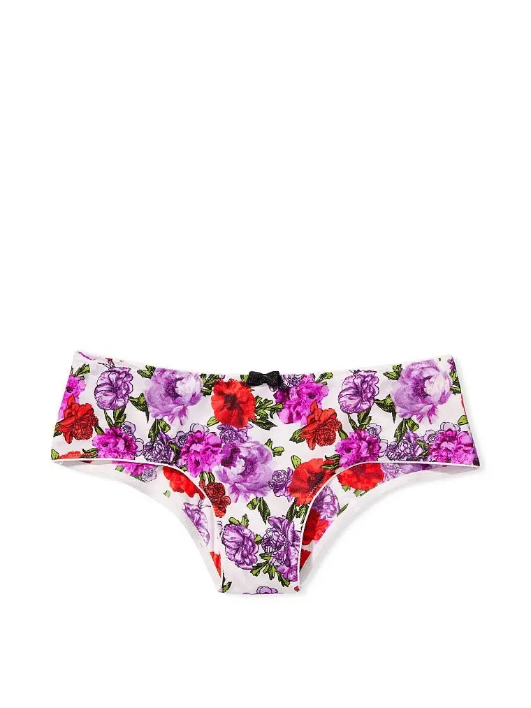Bombacha de corte hipster con estampado floral en tonos violetas, rojos y blancos. Detalles de moño negro en la parte delantera y borde blanco. Ideal para un look femenino y cómodo.