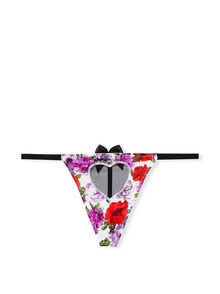 Bombacha de mujer con estampado floral y detalle de corazón. Diseño con moño en la parte delantera.