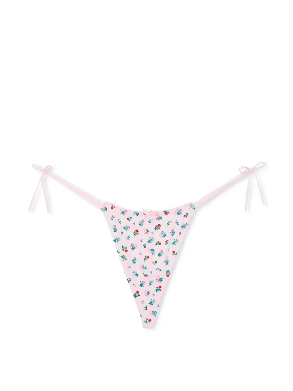 Bombacha de corte tanga con estampado floral en tonos rosas y detalles de lazos en los laterales. Ideal para un look delicado y femenino.
