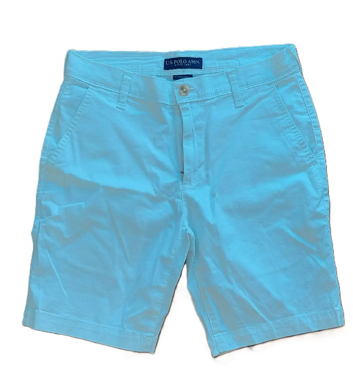 Short de gabardina blanco corte chino de hombre, con dos bolsillos traseros y dos delanteros. Marca U.S. Polo Assn. ACTIVATE STRETCH