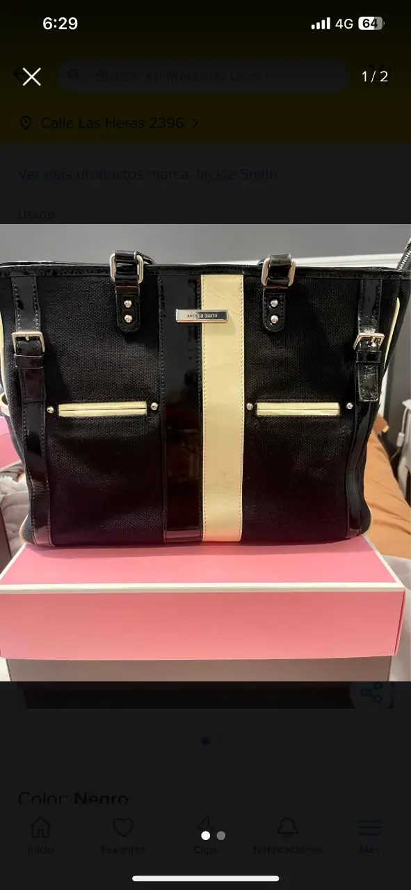 Cartera Jackie Smith negra con detalles en blanco y negro. Ideal para el trabajo o salidas.
