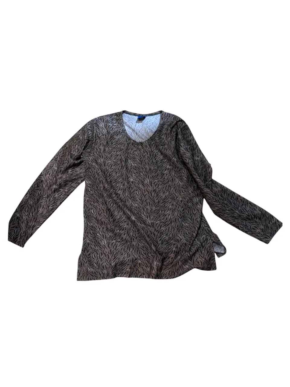 Buzo Balmain con estampado animal print en tonos marrones y cuello en V. Manga larga. Ideal para un look sofisticado y moderno.
