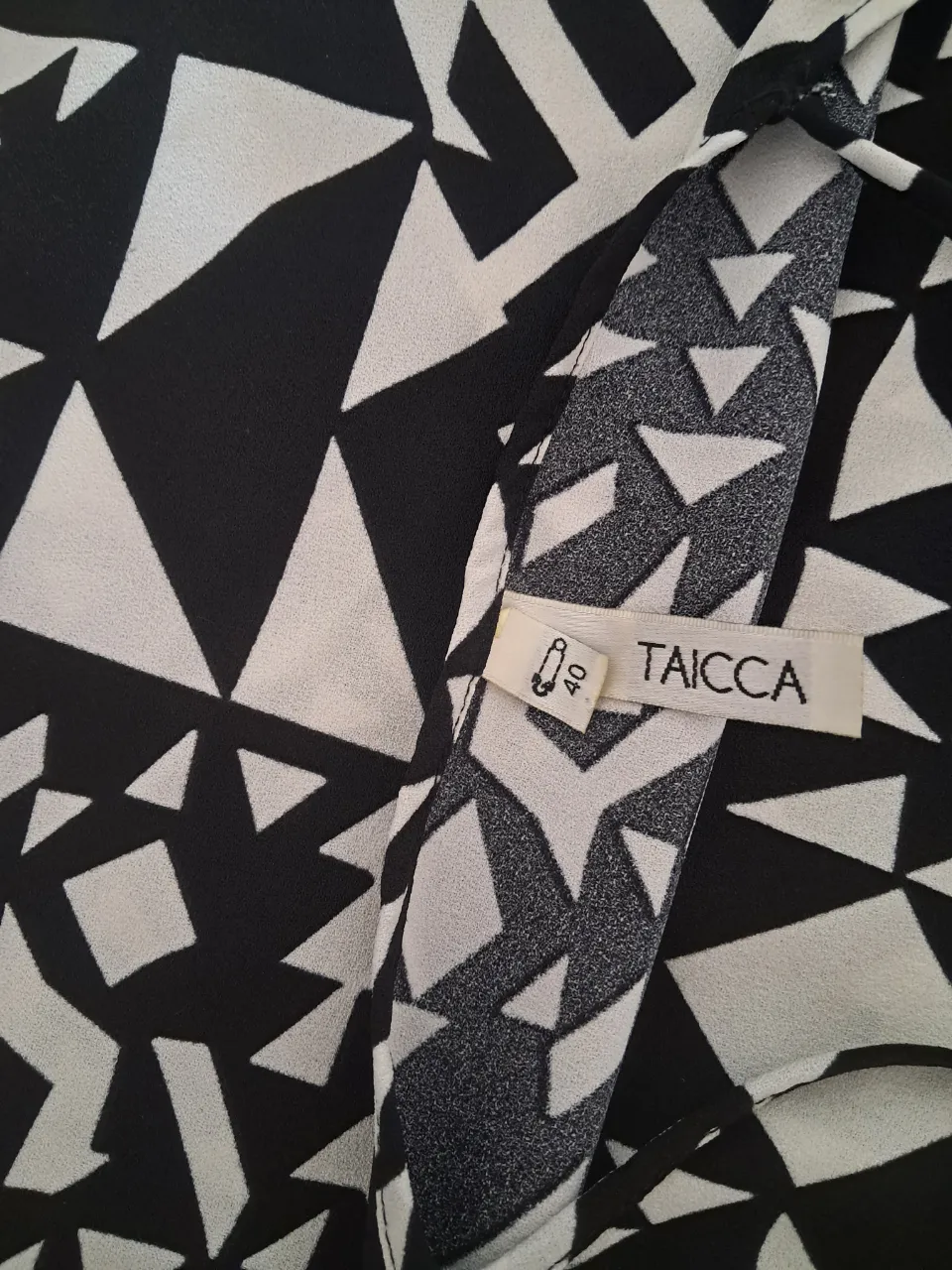 Top Taicca - Vista 4