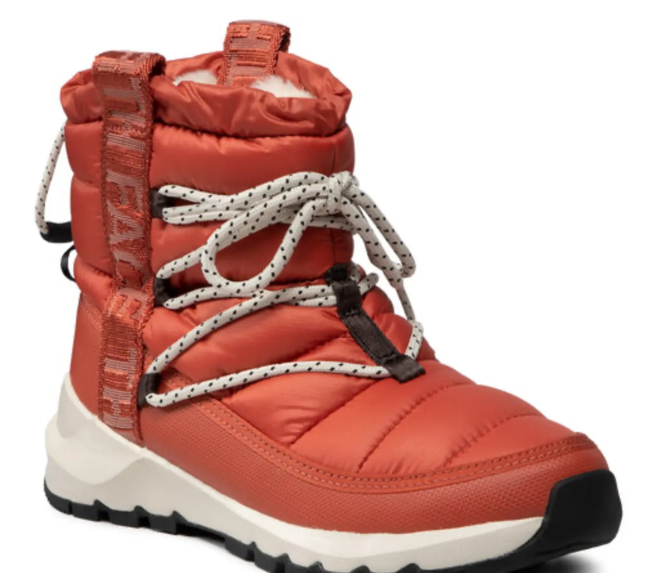 Botas de invierno para mujer, color naranja con detalles en blanco y negro. Diseño acolchado y cordones. Ideales para climas fríos y actividades al aire libre.