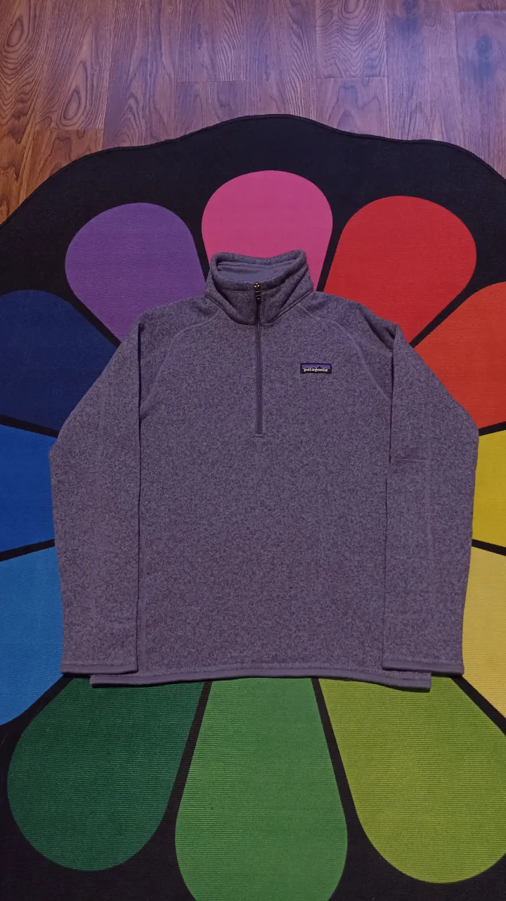 Patagonia hilo medio cierre 
Talle L mujer 
Medidas:
Ancho axila 46cm
Largo 60cm
Excelente estado 