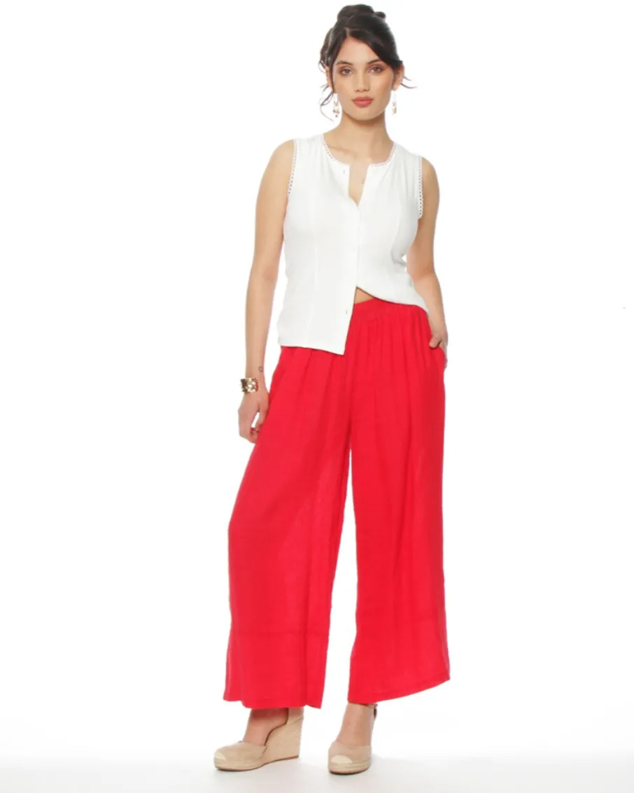 Pantalón palazzo de morley,  rojo vibrante, ideal para un look fresco y canchero. Su corte ancho y tela liviana lo hacen perfecto para días de sol o para estar cómoda en casa. Cintura ancha con elástico, talle único, estira. Casi nuevo! 1ra foto ilustrativa.