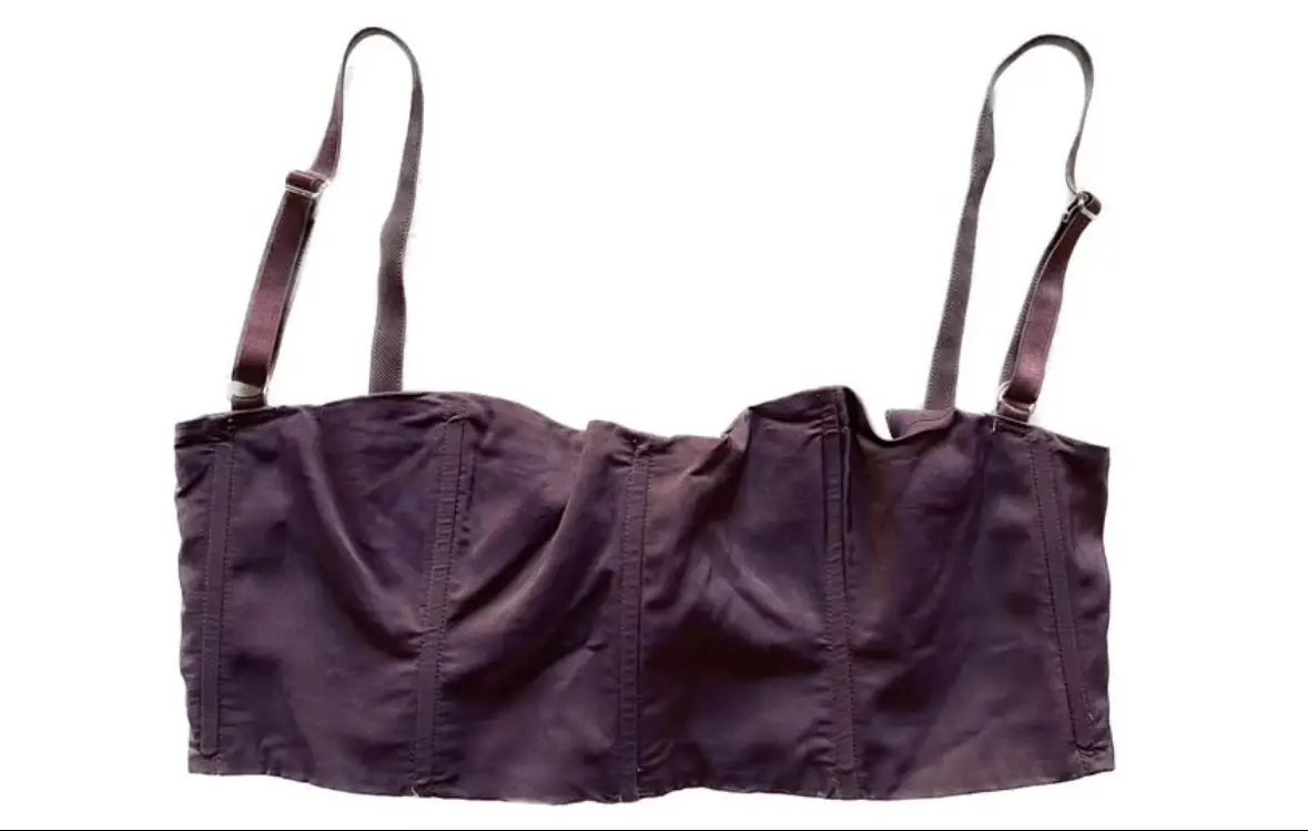 Top corset de mujer, color marrón oscuro. Con tirantes ajustables y cierre en la parte delantera. Ideal para looks de fiesta o salidas.