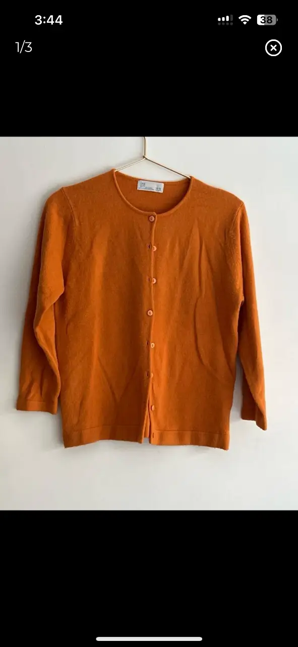 Cardigan naranja de Zara Girls, ideal para un look casual y abrigado. Confeccionado en acrílico, este sweater es perfecto para el otoño. Talle 14-16.