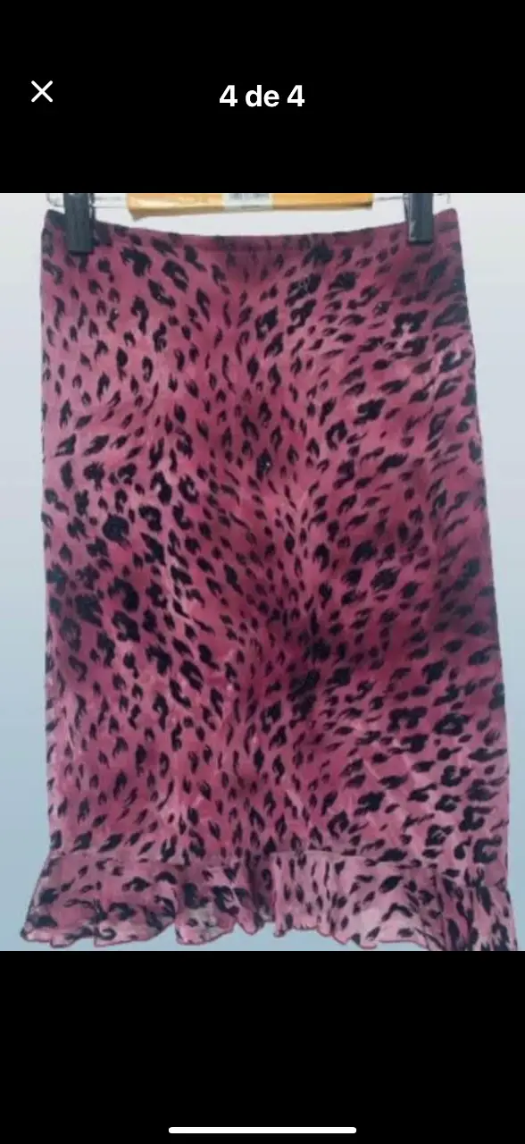 Pollera de gasa animal print en tonos rosados y detalles negros. con brillo. Ideal para un look audaz y moderno.totalmente forrada importada