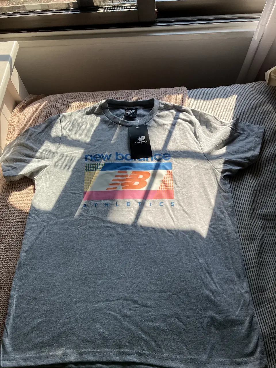 Remera New Balance - Vista 2