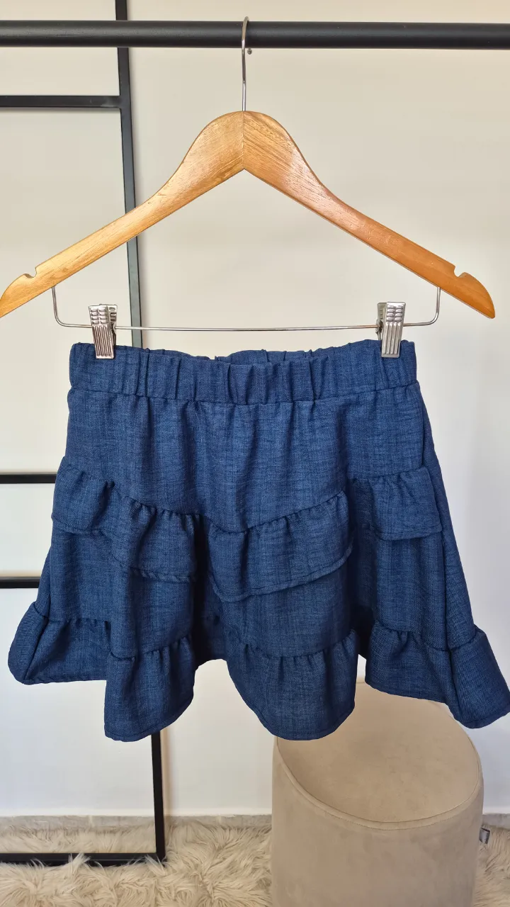 Pollera volados.
Nueva.
Talle 1.
Cintura elastizada.
Cintura 30 cm
Largo 36 cm