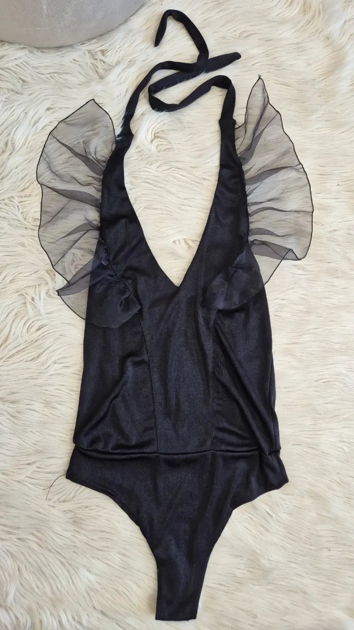 Body elastizado.
Nuevo.
Talle único.