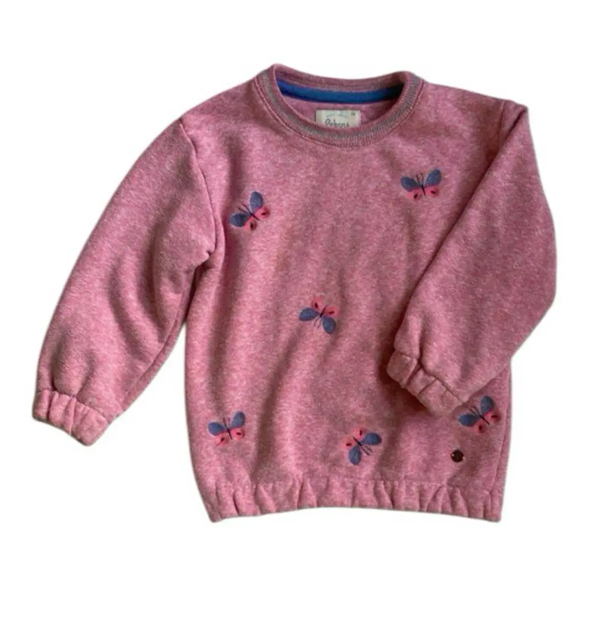 Buzo rosa de niña con estampado de mariposas. Talle 12. Ideal para el día a día.