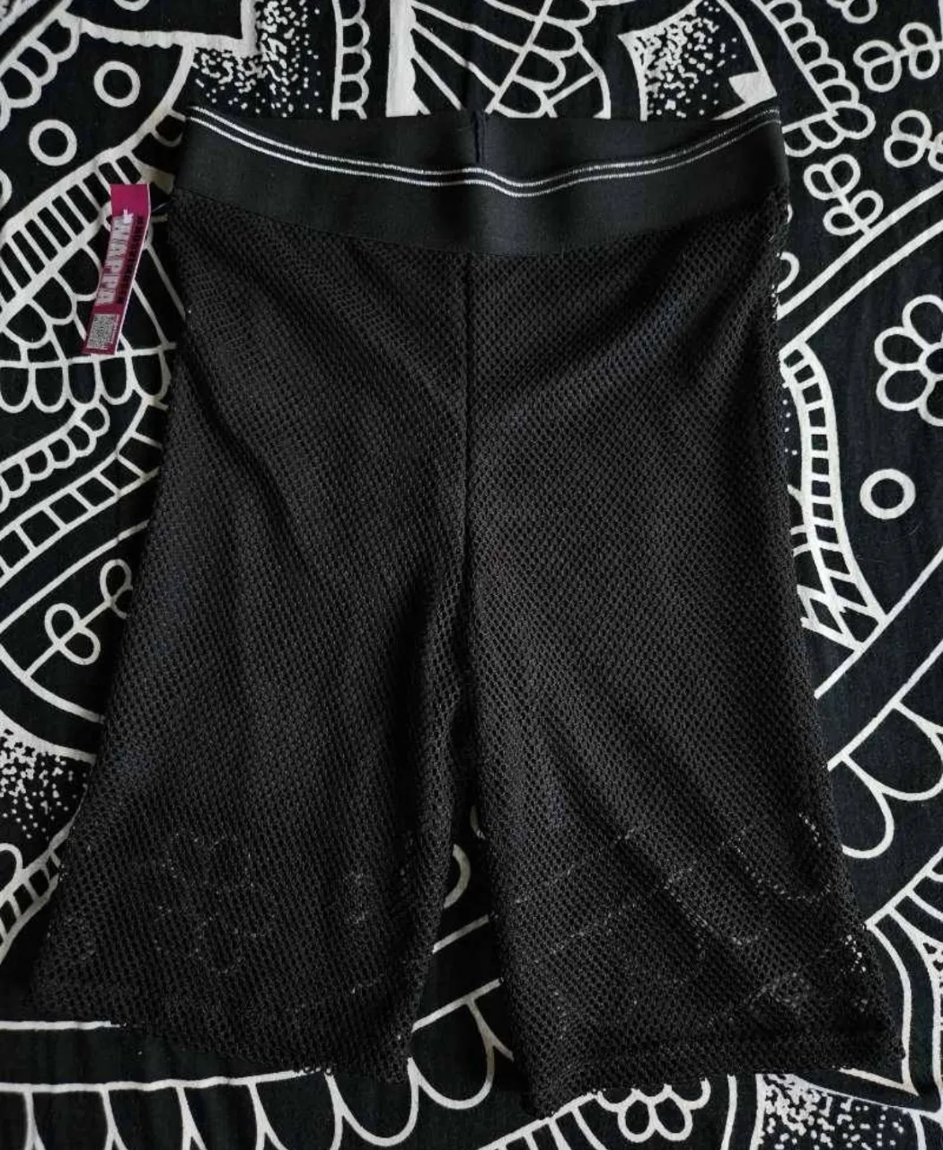 Biker de red negra com forro y con cintura elastizada.